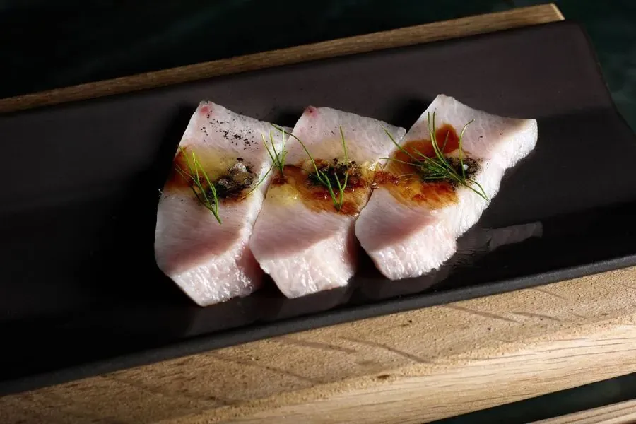 Nigiri plated at the omakase counter